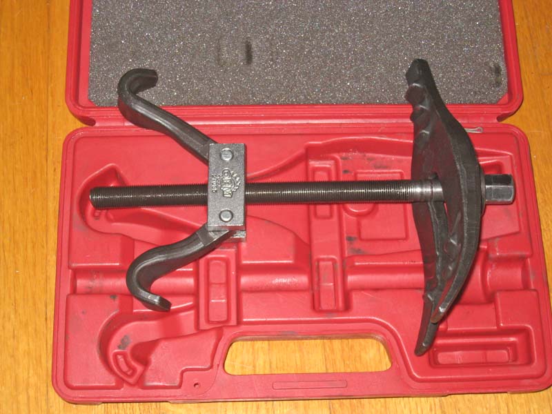 Internal spring compressor discount